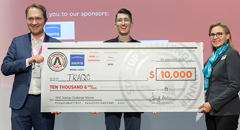 Jenoptik's Ralf Kuschnereit, TRAQC's Benjamin Dringoli, and 2024 SPIE President Jennifer Barton at the 2024 SPIE Startup Challenge.