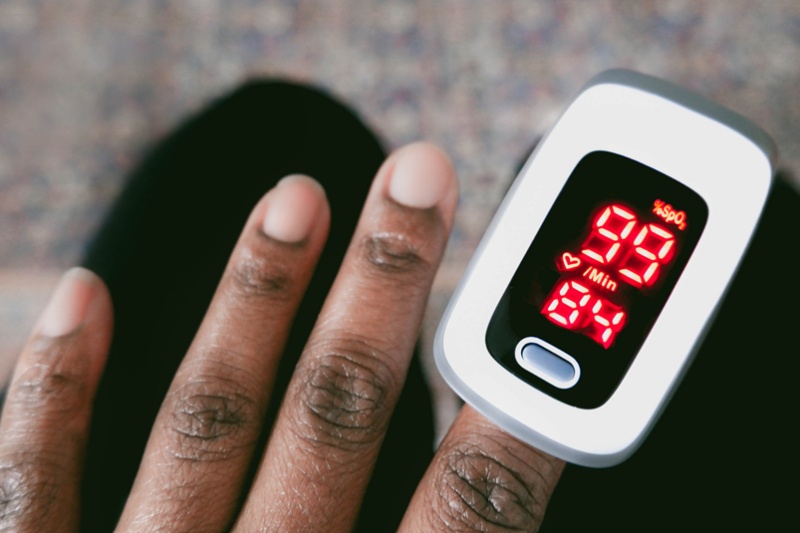 Pulse oximeters work by measuring light absorption at a specific red and near-infrared wavelength, but can be confounded by the similar absorption profiles of melanin and hemoglobin. Melanin concentration is higher in darker skin colors, meaning that a pulse oximeter could over-estimate a patient's oxygen saturation in the blood - potentially leading to adverse outcomes. A new independent review by a UK panel of experts is urging action by users and manufacturers of pulse oximeter devices and other optical equipment used in healthcare, to ensure equity across different skin types. Photo: FDA.