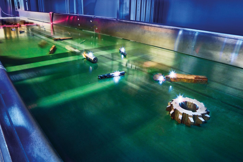 Laser-induced breakdown spectroscopy (LIBS) detects valuable alloys in scrap metal, which robots separate by type. The process creates the basis for closed material cycles without downcycling. &copy; Fraunhofer ILT, Aachen, Germany / Volker Lannert.