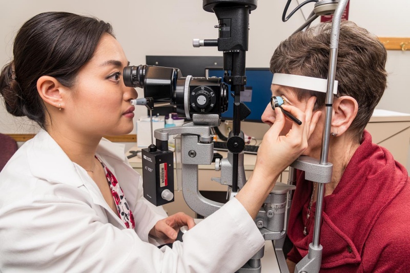 Jella An, MD, an assistant professor of ophthalmology and a fellowship trained glaucoma specialist at MU Health Care examines a patient. California startup ViaLase has won investor support for its development of a femtosecond laser system for non-invasive glaucoma tratement. Credit: MU Health Care.