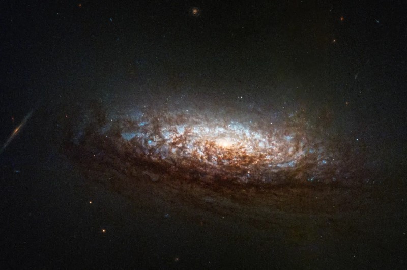 The galaxy NGC 1546, captured this week by the NASA Hubble Space Telescope operating in its new 