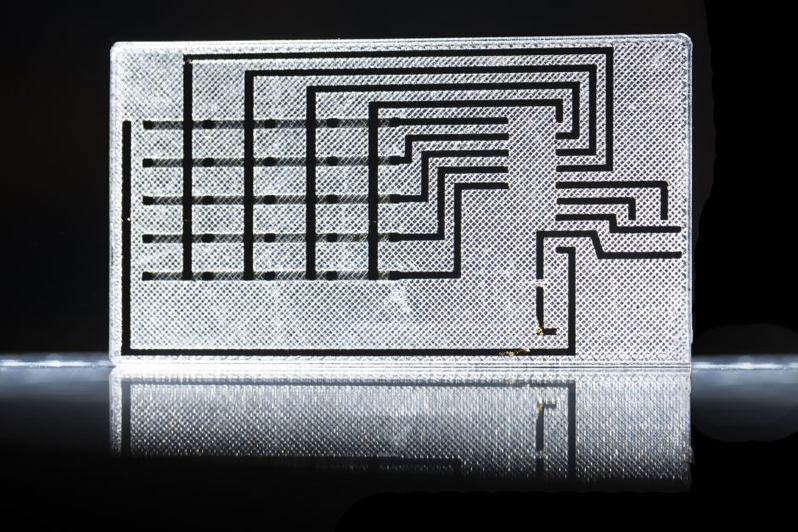 An example of electrodes printed inside of a plastic material. Specifically, other techniques fall short when it comes to how versatile the material can be and how precisely smaller components can be placed inside larger 3D structures. Photo: Sam O'Keefe, University of Missouri.