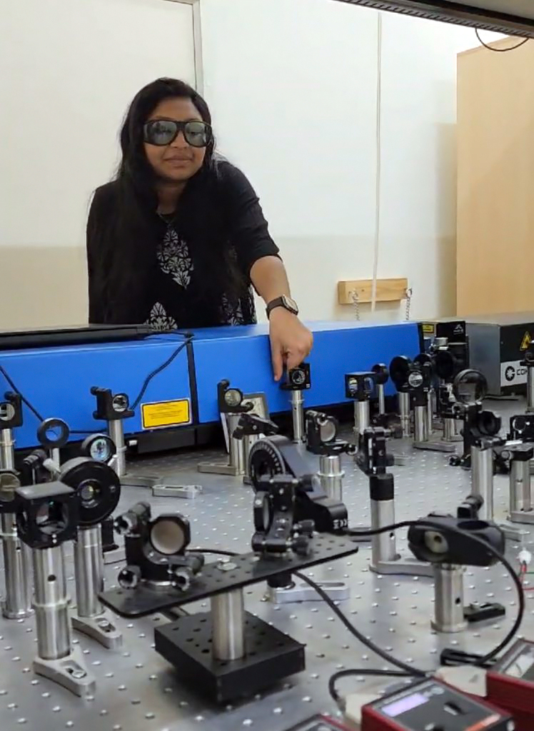 Lead author Jyothsna KM aligning optical beams for up-conversion experiments. Photo: Harinee Natarajan, IISc.