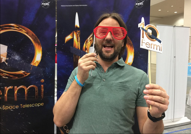 Jeremy Perkins working the NASA Fermi booth at the 2018 USA Science and Engineering Festival in Washington DC. Credit: Jeremy Perkins.