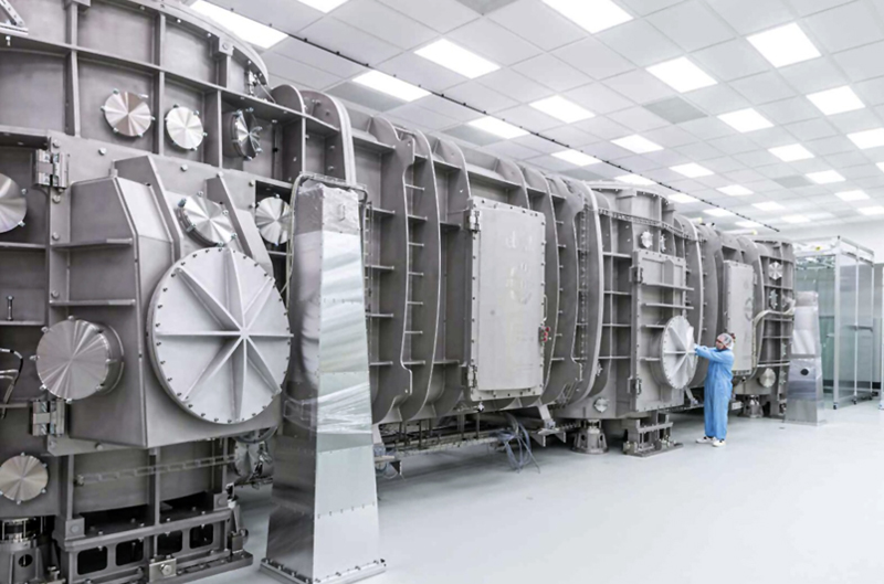 Beam us up: A newly funded research project combines the theoretical expertise of University of Rochester scientists with the theoretical and experimental capabilities of ELI Beamlines in the Czech Republic. Pictured is the compressor for generating the ultrahigh-intensity laser pulses required for the project. Photo courtesy of ELI Beamlines.