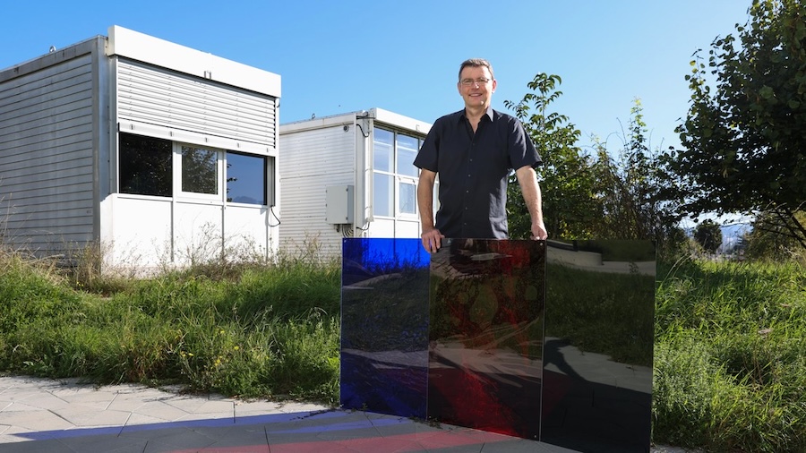 Senior scientist Jan Wienold with the colored filters used during the experiment. Credit: EPFL/Alain Herzog.