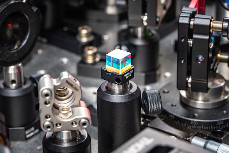 A close-up of a beam-splitter cube found among the Harel Group's laser instrumentation. Credit: Paul Henderson, Finn Gomez/College of Natural Science.  