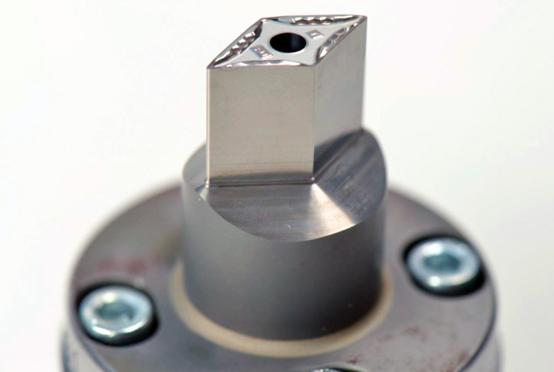 A mold tool for cutting inserts from tungsten carbide-cobalt was first USP-structured and then polished with the same laser. The mechanical processing of such hard materials is associated with extensive and costly tool wear. &copy; Fraunhofer ILT, Aachen, Germany.