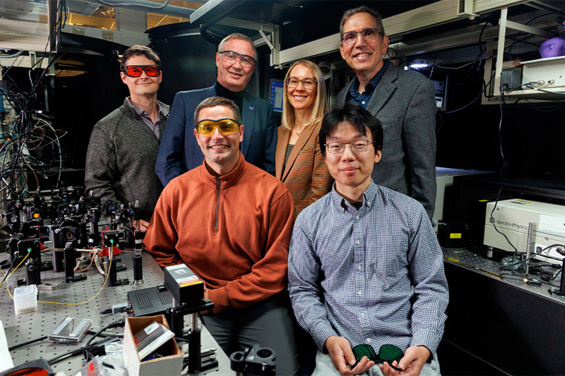 Top row, from left to right: Colton Fruhling, a post-doctoral researcher; Vladimir Shalaev, Bob and Anne Burnett Distinguished Professor; Alexandra Boltasseva, Ron and Dotty Garvin Tonjes Distinguished Professor; and Alexander Kildishev, professor. Bottom row, from left to right: Demid Sychev and Peigang Chen. Image: Purdue Engineering.
