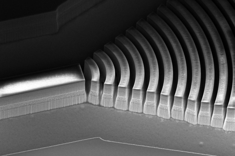 The comb uses a double-chirped mirror (DCM), pictured, which is a special type of optical mirror that has multiple layers with thicknesses that change gradually from one end to the other. Image: Courtesy of the researchers.