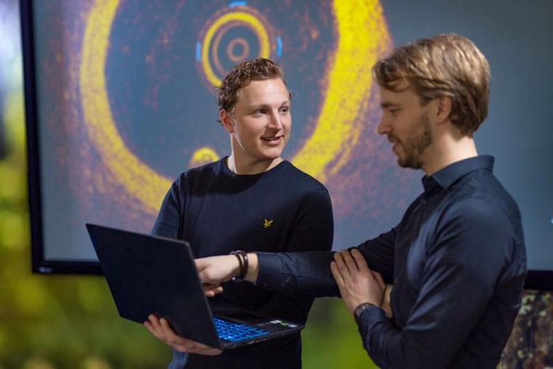 Technical physician Jos Thannhauser shows an OCT image of the coronary artererial walls at Radboud university medical center to find week spots in the arteries around the heart. Credit: Radboudumc.
