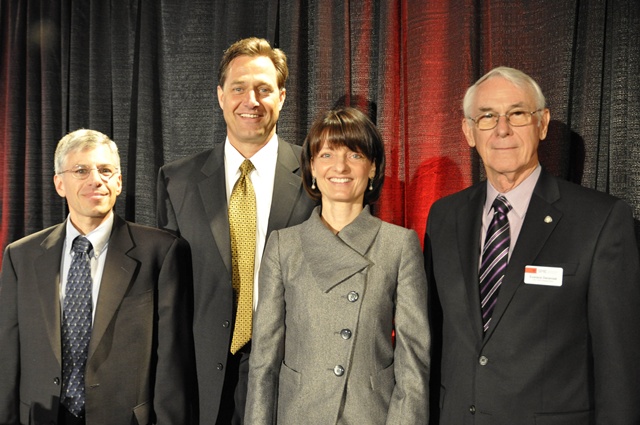 Dugan (third from left) was speaking at the SPIE Defense, Security and Sensing 2011 conference in Orlando, Florida. From left: William Jeffrey (Symposium Chair, HRL Labs), Kevin Meiners (Symposium Co-chair, Office of the Secretary of Defense), Regina Dugan (Director, DARPA), Eustace Dereniak (SPIE President Elect). Credit: SPIE.