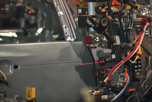 On Ford's assembly line, the robotic laser inspection systems are being used to ensure that car doors are fitted with a greater precision than is possible with a human operator. The end result should be a reduction in cabin wind noise across the fleet of models that Ford produces - which the company believes to be a major factor in customer choice. Credit: Ford.