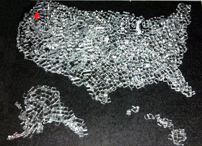 Glass act: Map made from 1x1 mm glass cubes cut by filament method from large hardened glass sheet, at up to 500 mm/s, in a single pass, with no chips or cracks.