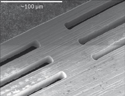 The short-picosecond pulses produced by Lumera's lasers provide for high-precision, high-quality micromachining because virtually no heat is transferred to the target material. This image shows some 15 &mu;m-wide slots machined into a 20 &mu;m-thick silver sheet using a picosecond source from Lumera. Credit: Lumera Laser/Coherent.