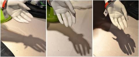 In a demonstration of the improved light quality produced by Soraa's MR16 halogen replacement, this composite image shows how the single source of light in Soraa's design (far right) yields a crisper, more clearly defined shadow than LED-based replacements featuring multiple emitters (center) or even MR16s themselves (left). Credit: Soraa.