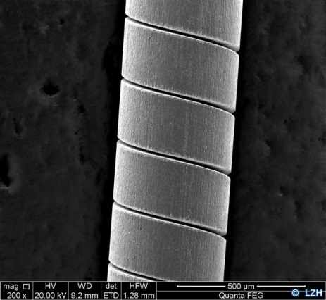 Electron microscope image of a nickel-titanium tube, showing microstructures made with a femtosecond laser. Eco-Laserfact aims to stimulate innovation in the laser micromachining sector, supporting small companies in North-West Europe. Credit: Laser Zentrum Hannover.