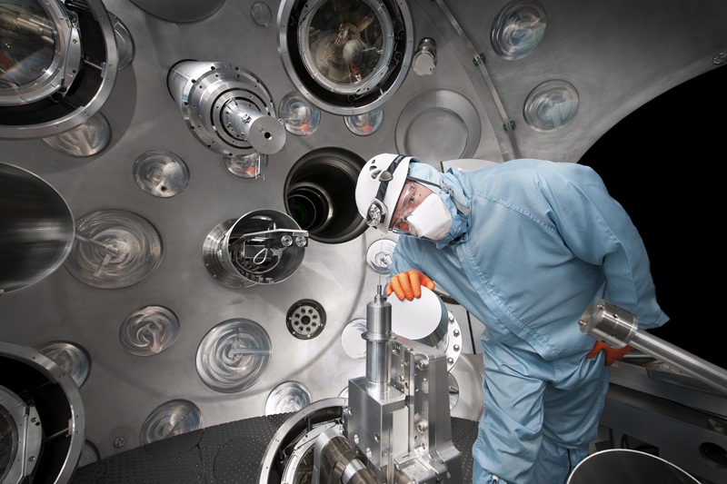 An engineer positions the target where Orion's 12 beamlines will converge to recreate conditions at the heart of a nuclear detonation, or a star. Credit: &copy; British Crown Owned Copyright [2012]/AWE.
