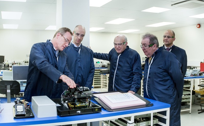 Vince Cable, the UK government's business secretary, visiting Gooch & Housego's expanded Torquay site in late 2013. Credit: G&H.