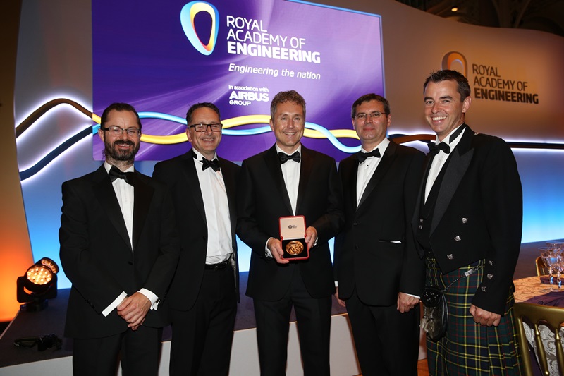 The Cobalt Light Systems team receive the MacRobert Prize Medal. From left: Guy Maskall, Data Scientist; Craig Tombling, Chief Operating Officer; Paul Loeffen, Chief Executive Officer;  Pavel Matousek, Chief Scientific Officer; Stuart Bonthron, VP Product Development. Credit: Rob Falconer/Royal Academy of Engineering.