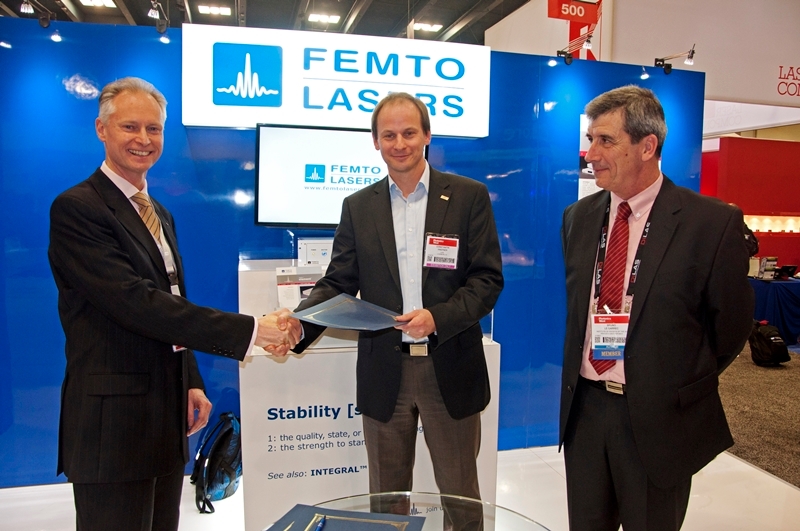 From left: Femtolasers CEO Andreas Stingl, Lawrence Livermore's Constantin Haefner and ELI Beamlines technical director Bruno Le Garrec co-sign a tender agreement at last years's SPIE Photonics West exhibition. Photo: Matthew Peach.