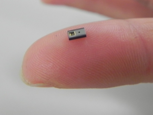Kyocera's tiny optical Doppler sensor, which incorporates a laser diode and photodiode within a single ceramic package, measures just 1mm by 1.6mm by 3.2mm. Sampling is set to begin in April 2017. Photo: Kyocera.