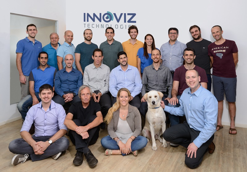 The Innoviz team in Israel includes a golden labrador called Winston. The company is actively hiring, with positions available for experts in 3D vision algorithms, embedded software development, digital design engineering, <del>chasing cats and fetching sticks</del>. Photo: Innoviz/PR Newswire.