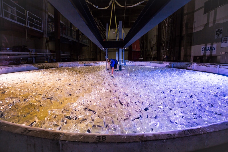 The last piece of glass is placed into the mold for GMT mirror number five. Casting began November 4, but only after melting, spinning, three months of cooling and years of high-precision polishing will the mirror be ready to ship to the GMT site. Photo:GMTO Corporation/University of Arizona.