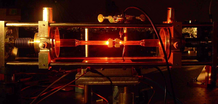 Radiofrequency discharge of the GINGERino ring laser. A helium-neon plasma is generated in the middle of one side of the ring through a pyrex capillary. Image: Belfi et al.