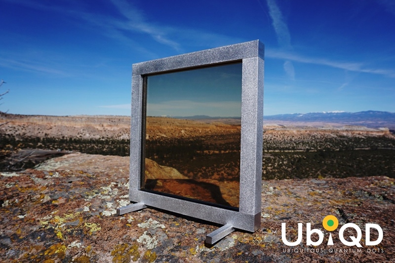 A prototype solar window, developed by UbiQD and measuring one square foot in area, shown here on a rocky outcrop near the startup company's headquarters in Los Alamos, New Mexico. Photo: UbiQD.