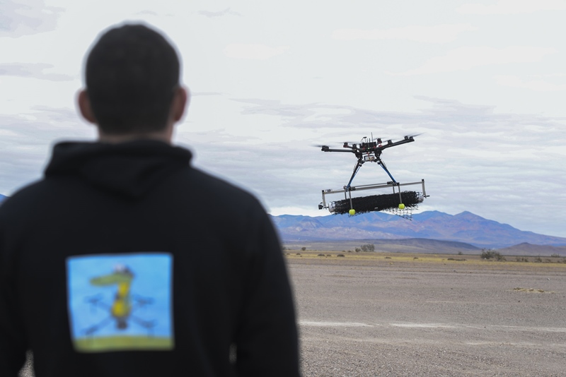 U.S. Air Force 2nd Lt. David Feibus, from Wright-Patterson Air Force Base, Ohio, flies a DJI S1000 drone during the setup and calibration phase of an event at the Nevada National Security Site in Las Vegas last year. UAV-mounted laser sensors look well-suited to a range of defense and commercial applications, but challenges such as dealing with rotor airflow and turbulence remain. Photo: U.S. Air Force/Wesley Farnsworth.