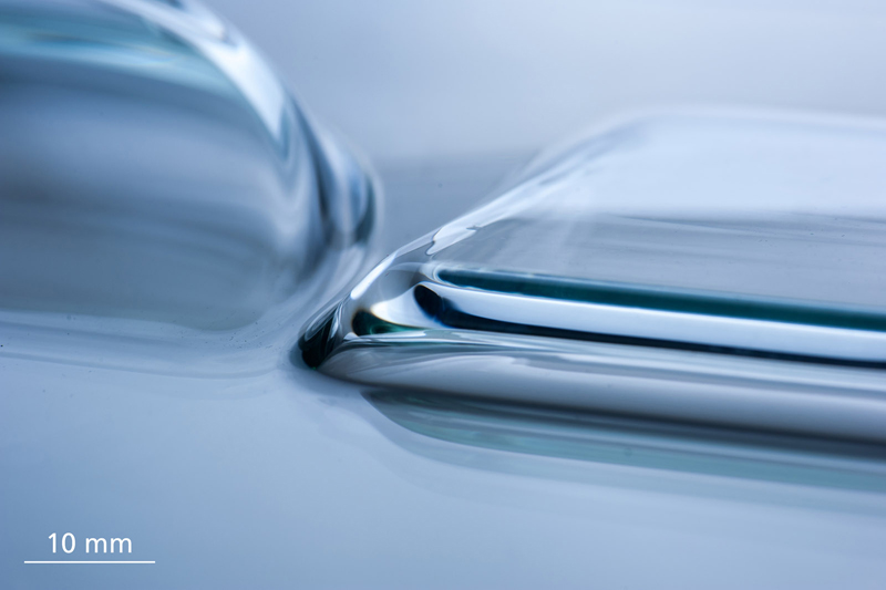 Bend it: Prototype sheet glass with very small radii, produced by laser-based glass forming. &copy; Photo Fraunhofer IWM.