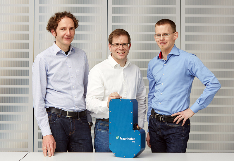 With the development of their holographic measurement technology Markus Fratz, Alexander Bertz and Tobias Beckmann (from the left) made it possible to fully inspect all parts in the production cycle in a matter of seconds. &copy; Photo Piotr Banczerowski / Fraunhofer.