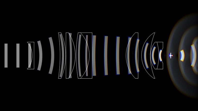 This illustration, from the lab of Spencer Smith of the University of North Carolina at Chapel Hill, shows how light propagates through an imaging objective designed for multiphoton imaging over multiple cortical areas with subcellular resolution. Light enters at the left, is focused through several lenses, and is brought to a focus just past a coverslip on the right. Image: Spencer L. Smith lab.