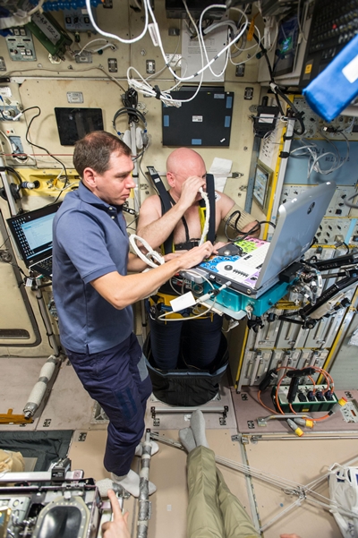 NASA astronaut Scott Kelly, wearing a Chibis Lower Body Negative Pressure (LBNP) Suit, undergoes ultrasound measurements for the 