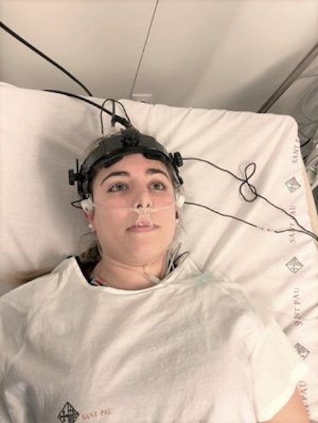 Using forehead sensors to emit and detect laser light, the new system could reveal early signs of neurological complications after stroke. Credit: Raquel Delgado-Mederos/Hospital de la Santa Creu i Sant Pau.