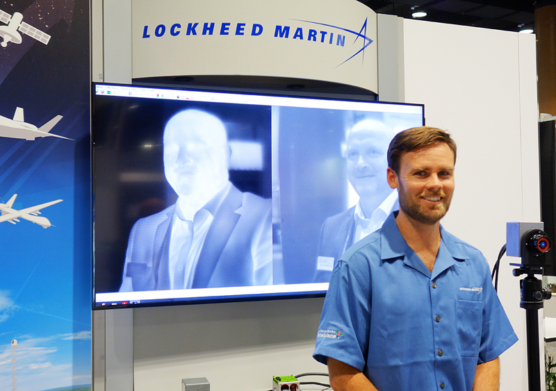 Seeing double: Lockheed Martin's Brendan McCay with camera and dual images. Photo: Paul Sudlow, Lockheed Martin.