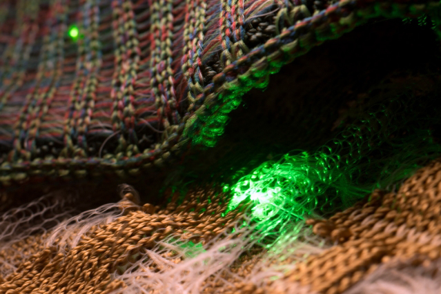 Soft fabrics: Researchers from MIT and AFFOA have produced fibers with embedded electronics that are so flexible they can be woven into soft fabrics and made into wearable clothing. Courtesy of the researchers.