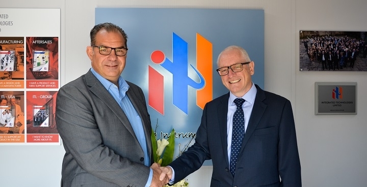 Done deal: G&H's COO Alex Warnock (left) shakes hands with ITL's managing director Tom Cole. The acquisition, worth up to &pound;22 million, should see G&H benefit from further diversification into the medical technology sector, while ITL is confident of gaining 'critical mass