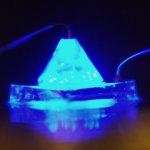 Wafer bonded LED chip with a hexagonal pyramid shaped ZnO electrode