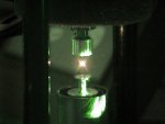 Lasing action from levitated laser droplets