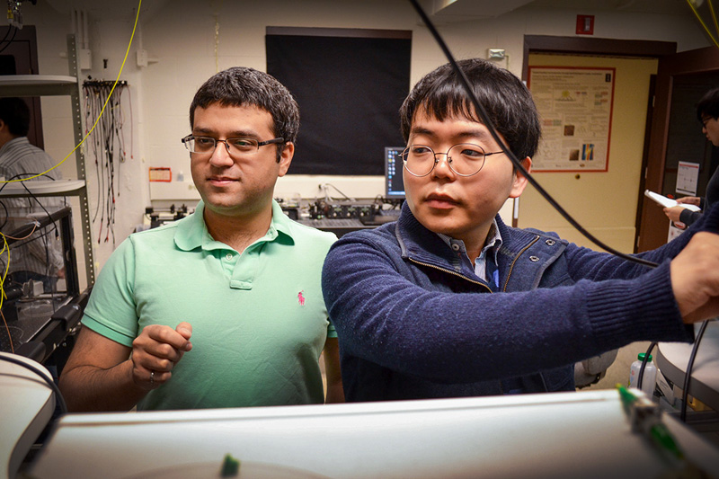 Transmission: Prof. Gaurav Bahl, left, and graduate student Seunghwi Kim.