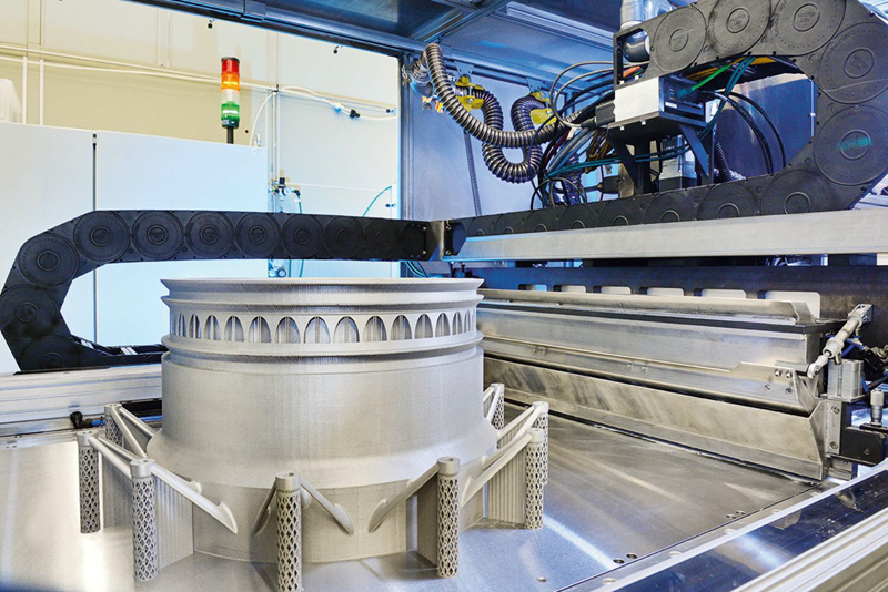 3D laser printing forms metal powder into prototype parts for Rolls-Royce engines.