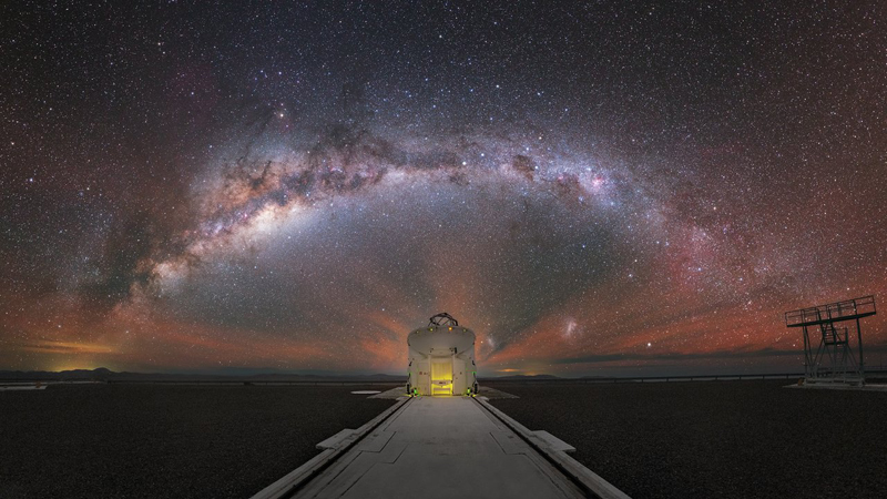 The Milky Way stretched out behind one of the Auxiliary Telescopes of ESO's VLT.