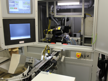 Expanded facilities: custom production machines from OpTek Systems. 