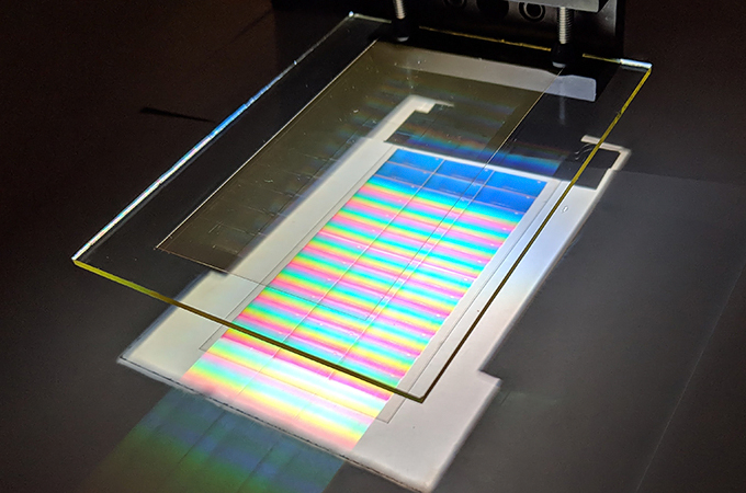 Holographic light collector separates the wavelengths of sunlight.