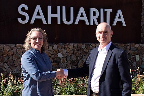 Sahuarita's Vice Mayor Kara Egbert welcomes PowerPhotonic CEO Roy McBride.