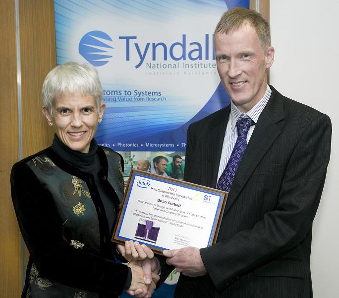 Kelin Kuhn, Intel, presents Tyndall's Brian Corbett with the award. 