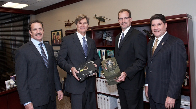 Daylight and Northrop executives with the CIRCM system