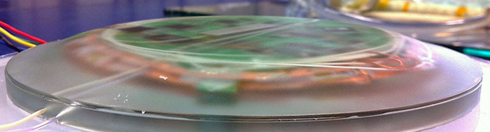 Photonic interrogator (diameter 100mm) after embedding in protective epoxy.